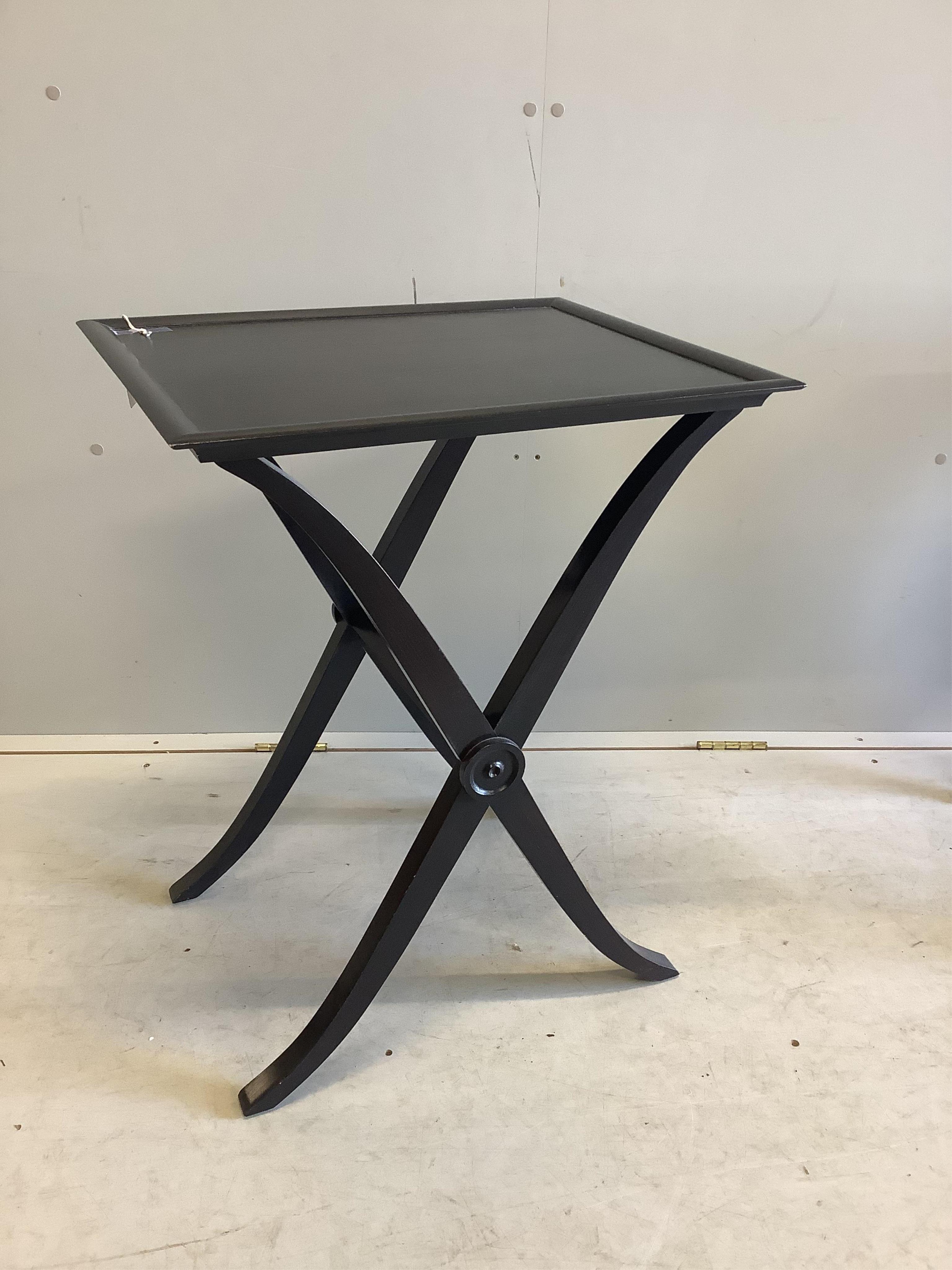 A pair of James Martin ebonised X frame lamp tables, width 55cm, depth 45cm, height 70cm. Condition - good